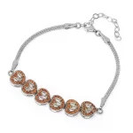 дамска сребърна гривна проба 925 с плътна верижка и елементи във формата на шест червени сърца обсипани с бляскави камъни